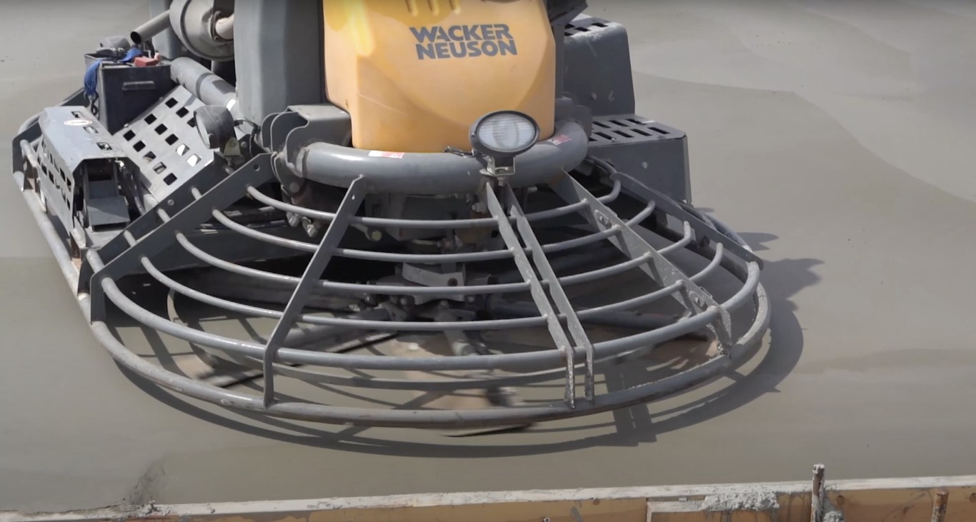 Commercial concrete finishing with power trowel in Metairie, LA